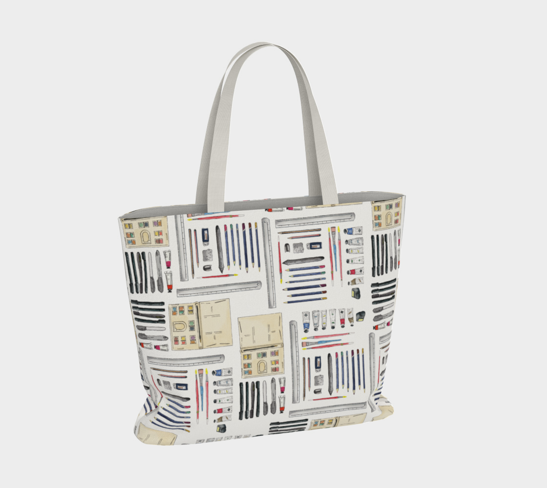 Art Supplies in a repeating pattern on a white background. Large market tote bag with white cotton canvas handles.