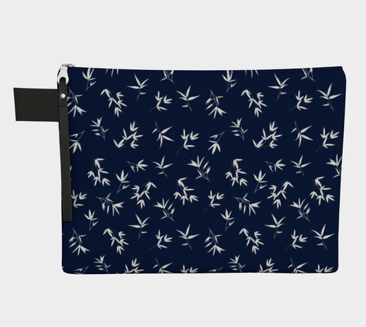 White bamaboo leaves in a tossed repeating pattern on a navy background. Zipper carry all pouch with vegan leather tab and pull straps.
