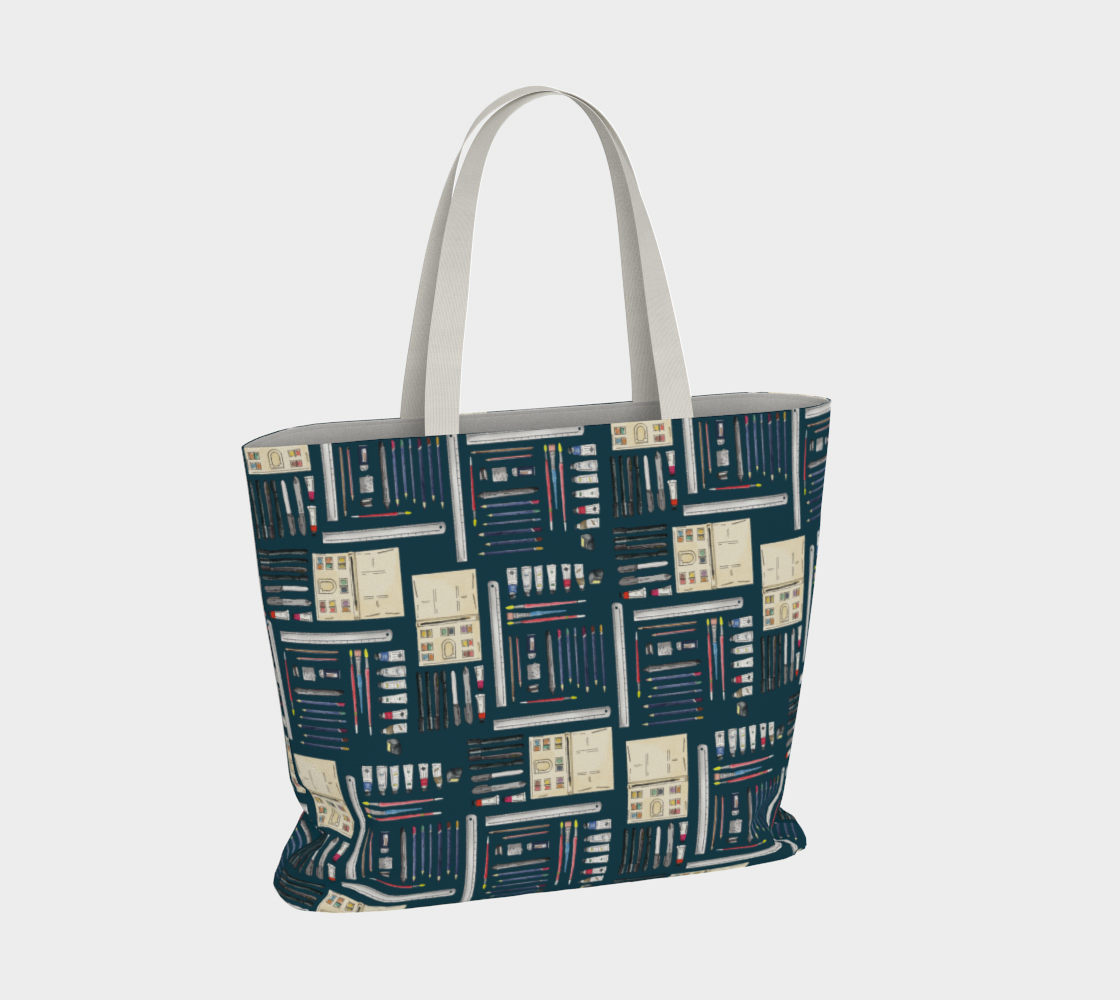 Art Supplies in a repeating pattern on a Dark Teal background. Large market tote bag with white cotton canvas handle. 