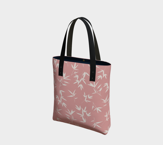 Bamboo leaves in a tossed repeat on a pantone rose pink back ground with vegan leather black straps