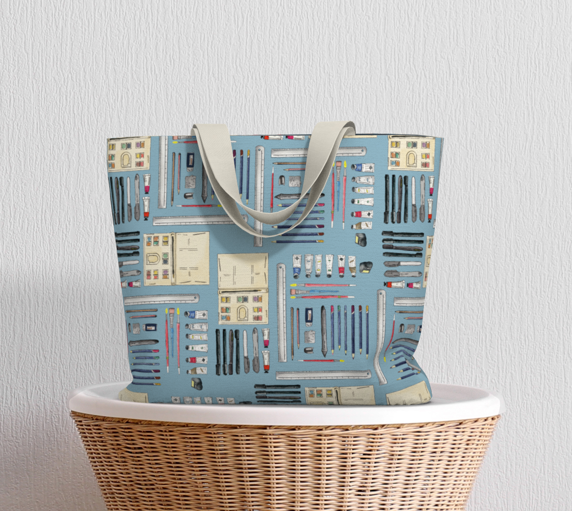 Art Supplies in a repeating pattern on a light blue background. Large market tote bag.