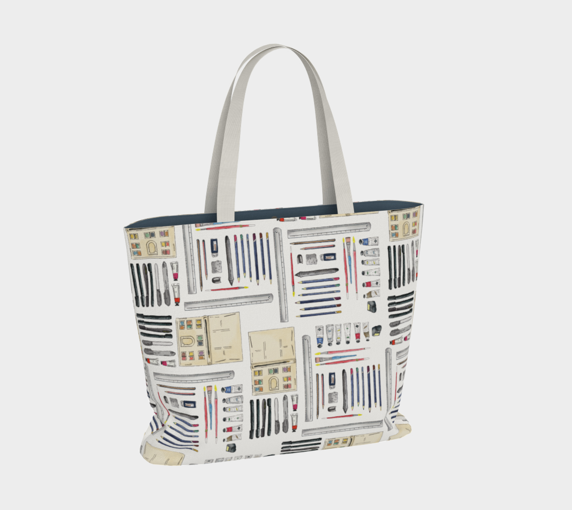 Art Supplies in a repeating pattern on a white background. Large market tote bag with white cotton canvas handles.